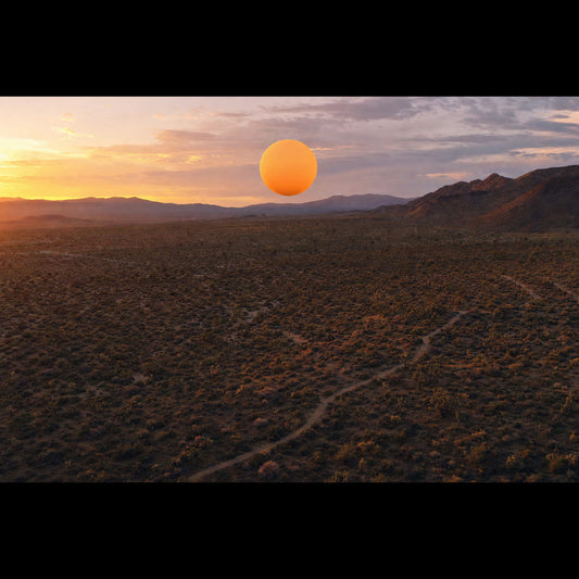 Aerial desert view of UAP orb phenomenon